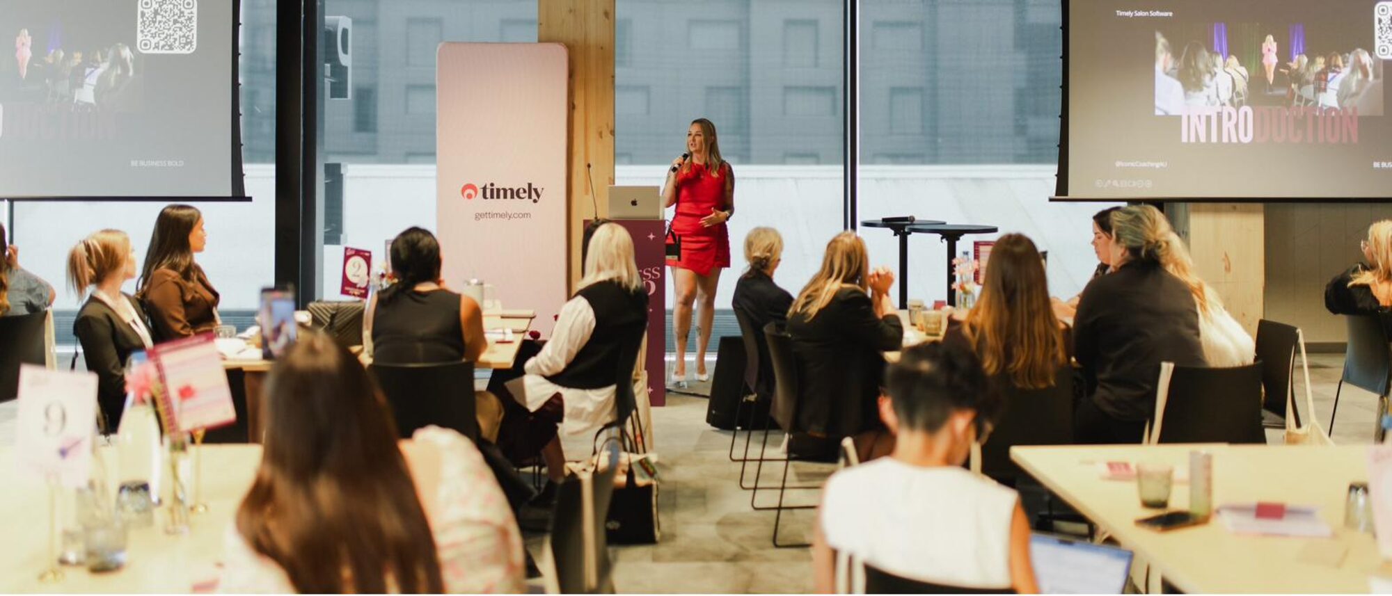Cait Muir presenting at a Timely event